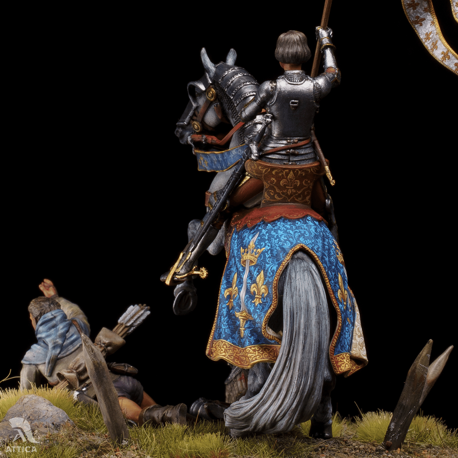 Blue and gold heraldry painted on the horse caparison