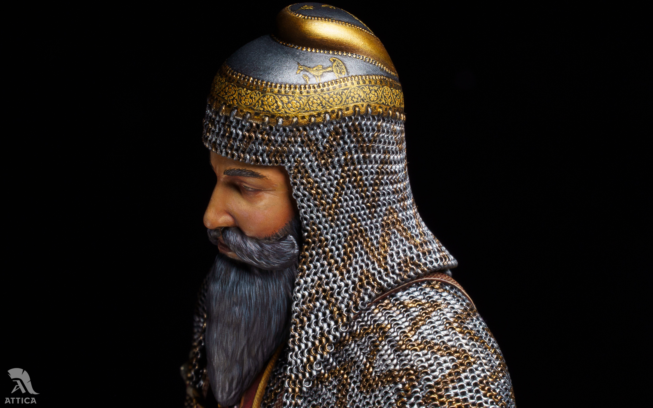 Close-up of Ganga-Jamuna mail pattern and gold ornament on the turban helmet