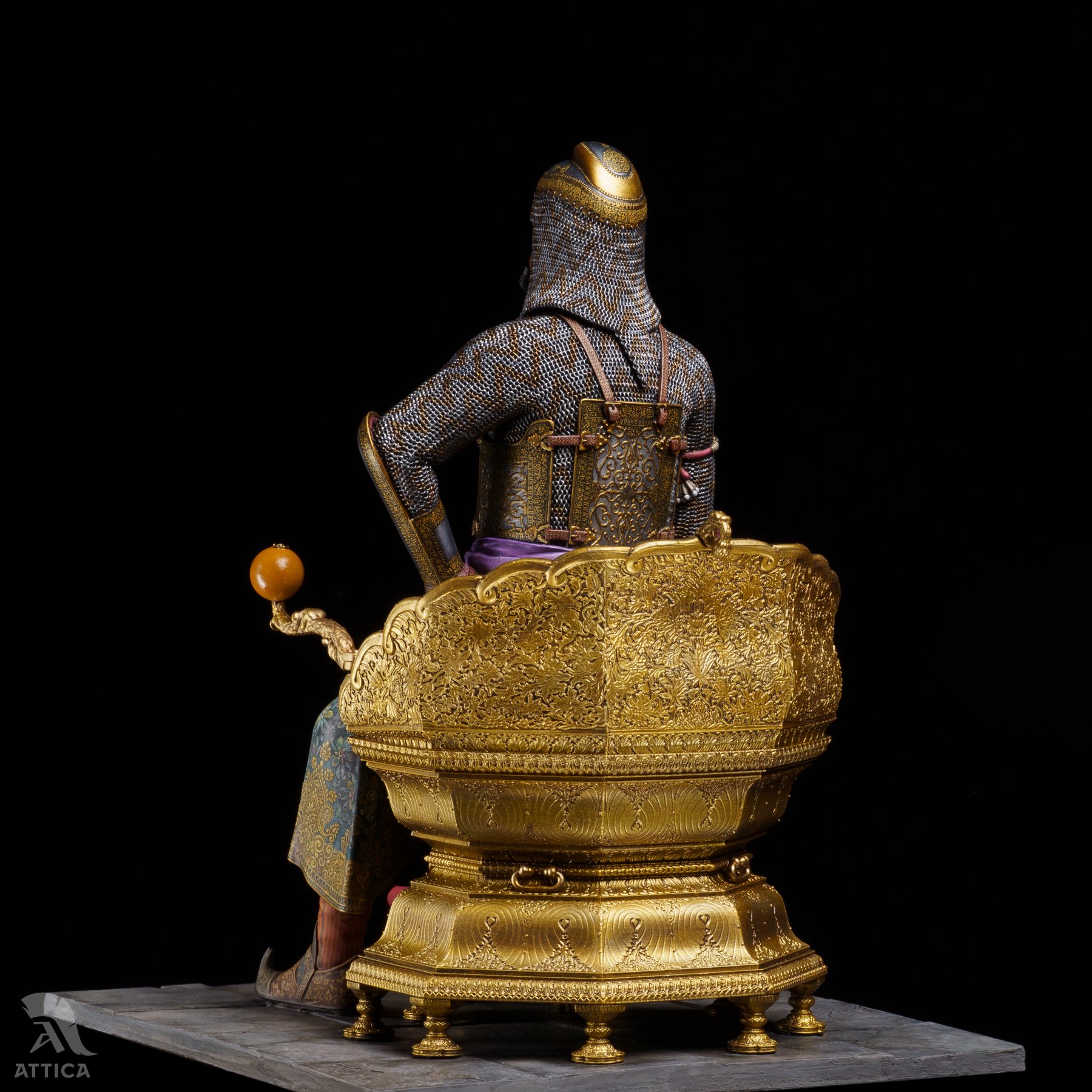 Rear three-quarter view of Maharaja Ranjit Singh miniature on the gilded throne